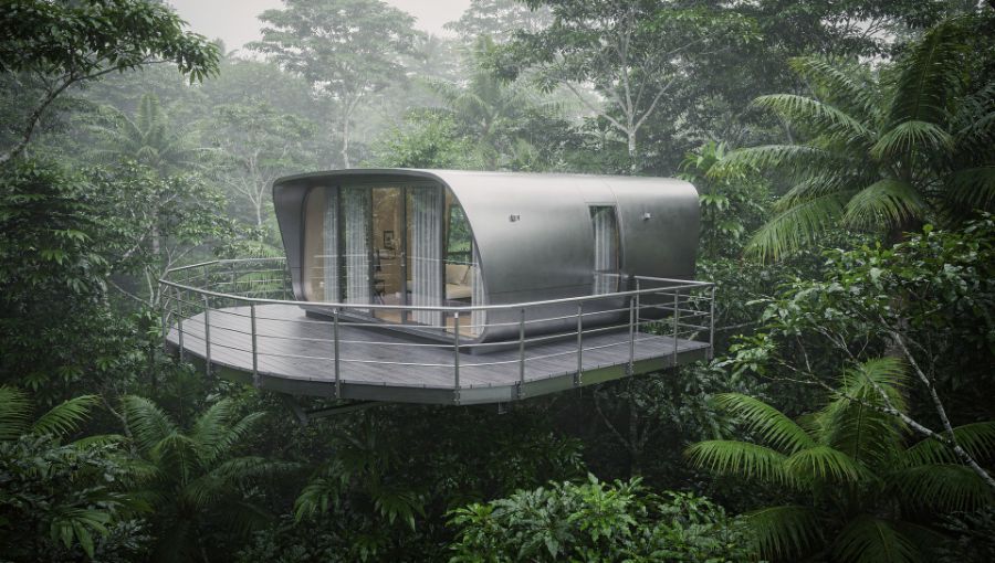 Rounded pod home on an elevated deck among treetops