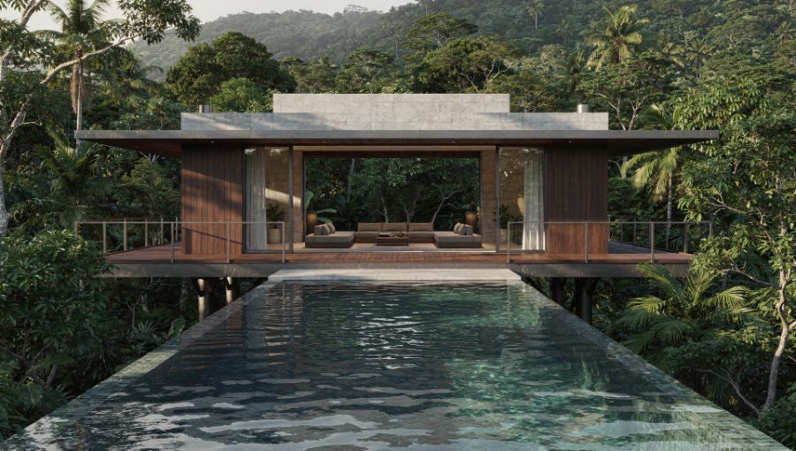 Open-air villa on stilts above an infinity pool in the rainforest